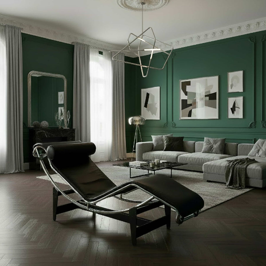 Modern living room with green walls, gray sofa, and a Chaise Longue - "4, Chaise Longue à reglage continu", designed by Le Corbusier, Pierre Jeanneret, Charlotte Perriand for Cassina 05
