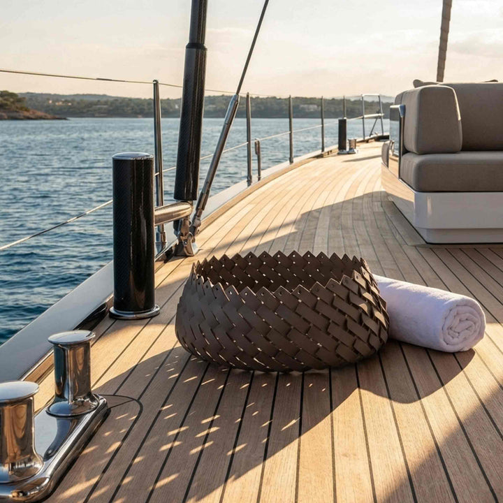 Oval Eco-Leather Basket ALMERIA by Pinetti on the deck of a yacht
