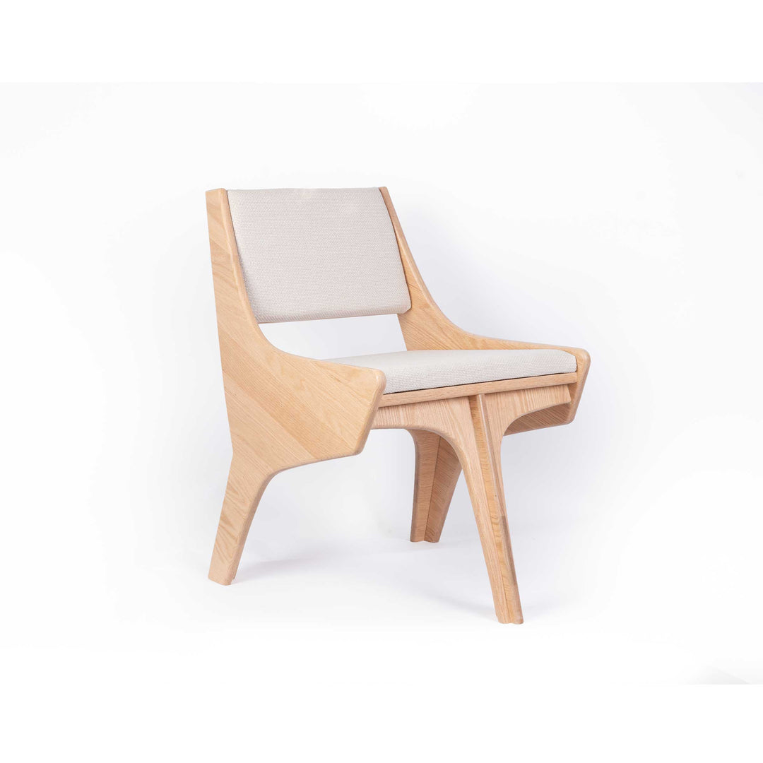 Falcone Cream chair by Jules Regis, oak wood structure with cream fabric upholstery, contemporary designer seating
