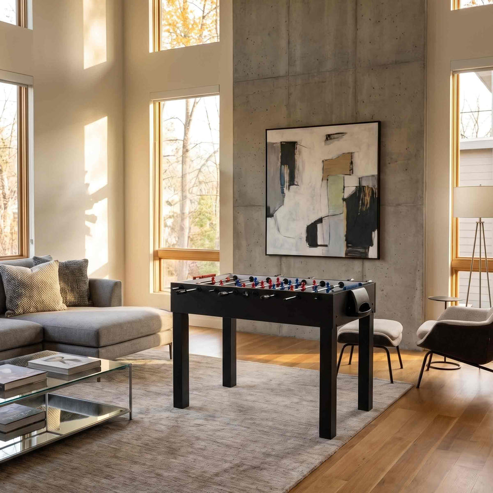 black Foosball Table FIDO by Basaglia and Rota Nodari for FAS Pendezza in a living room