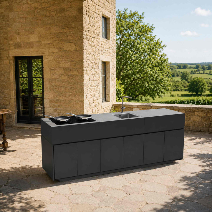 Black Outdoor Module Kitchen TIKAL by Talenti with Stainless Steel Pan FRYING PAN GLAMOUR STONE by Mepra in a terrace of a villa