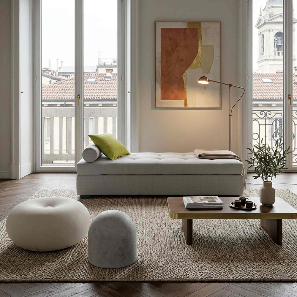 ISOLA  Storage Sofa Bed by Orizzonti Design Center for Horm in a living room with BARD pouf by Giulio Iacchetti by Internoitaliano and TATONE footrest by Denis Santachiara & Enrico Baleri for Baleri Italia